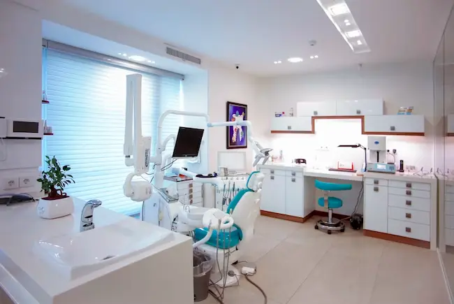 Dental bonding resin repair application on a front tooth